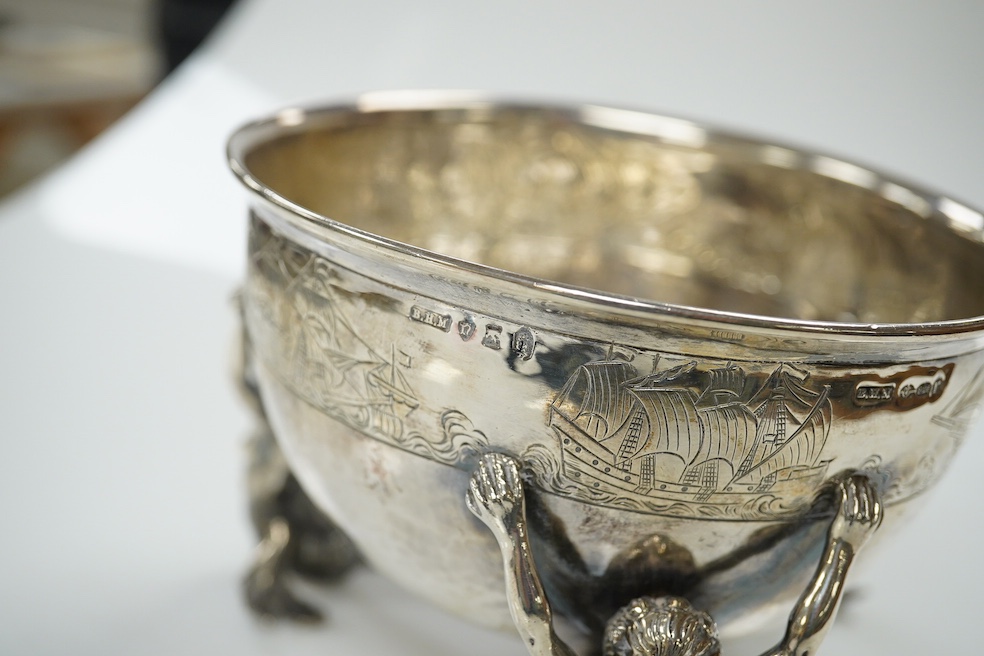 A George V Hanau silver bowl, import marks for Berthold Muller, with three Mermaid supports, London, 1912, diameter 13cm, 11.8oz. Condition - poor